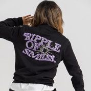 Woman Back wearing black sweater SU1 clothing brand