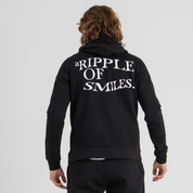 Man back wearing black hoodie SU1 brand clothing