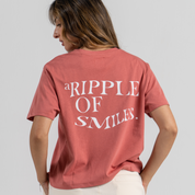 Woman back wearing pink tshirt mid crop SU1 clothing brand