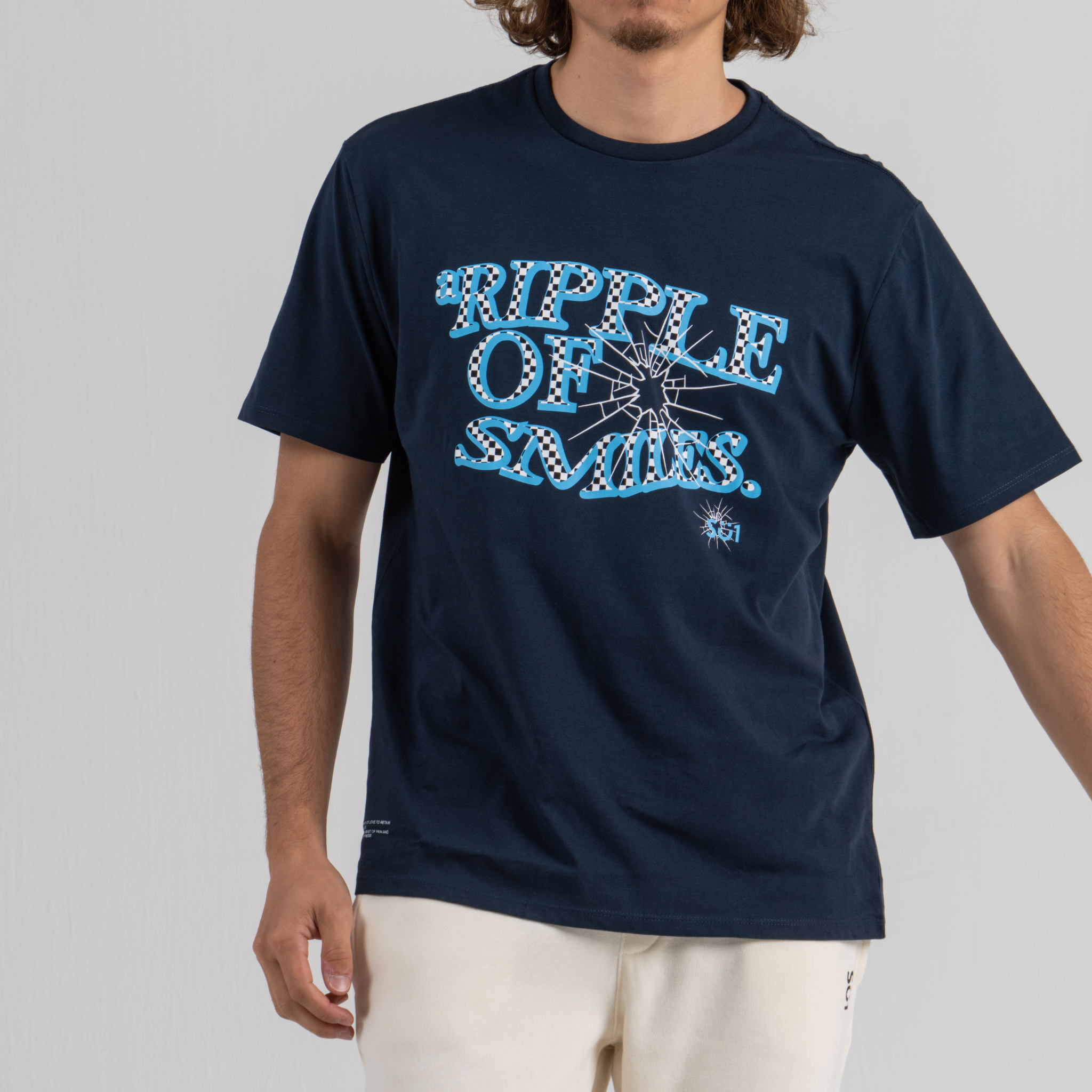 Men wearing dark blue tshirt SU1 brand clothing