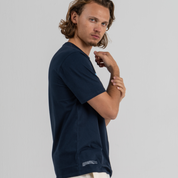 Men wearing dark blue tshirt SU1 brand clothing