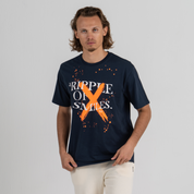 Man wearing dark blue tshirt SU1 brand clothing