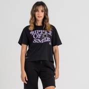 Woman wearing mid crop tshirt black SU1 clothing brand