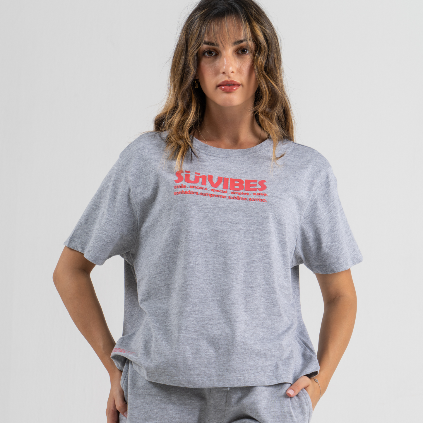 Woman wearing grey tshirt mid crop SU1 Brand clothing 