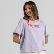 Woman wearing pink tshirt mid crop SU1 Brand clothing 
