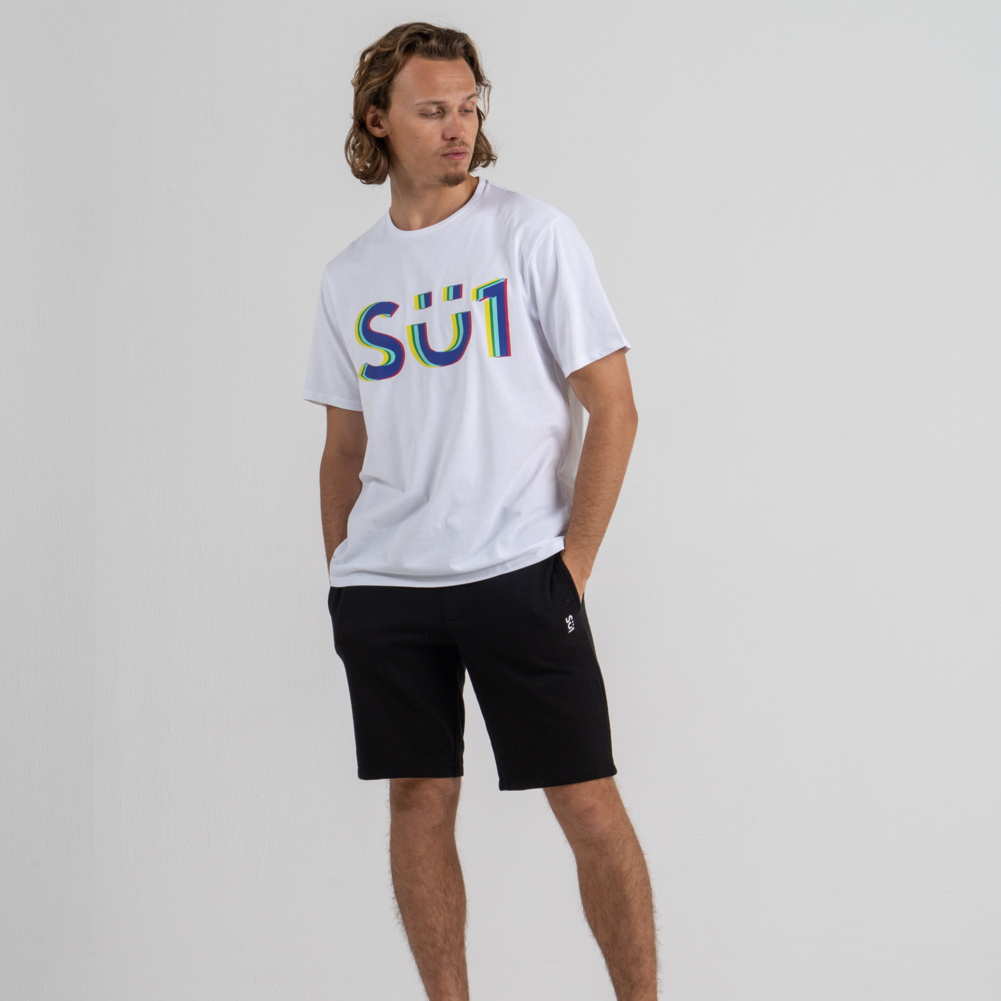 Men wearing white tshirt and black shorts SU1 brand clothing